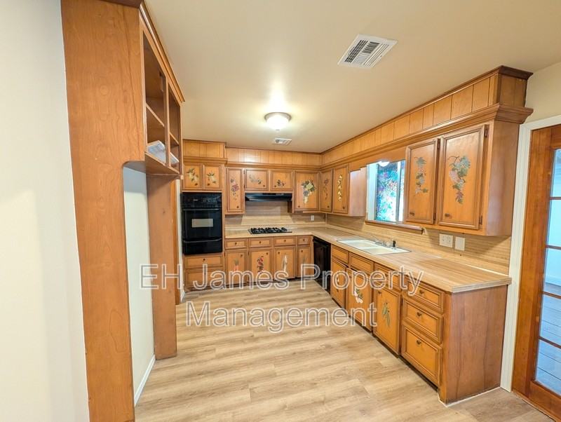 1814 S 108th East Ave - Photo 5 of 15