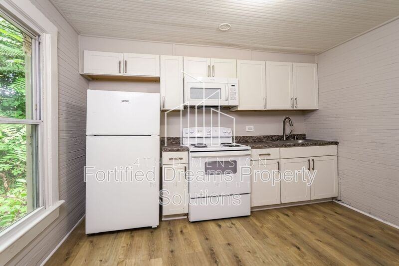 921 Ne 23rd St - Photo 7 of 18