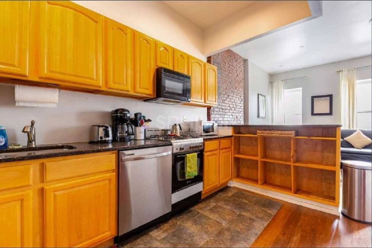 221 Malcolm X Blvd #1424338P - Photo 6 of 30