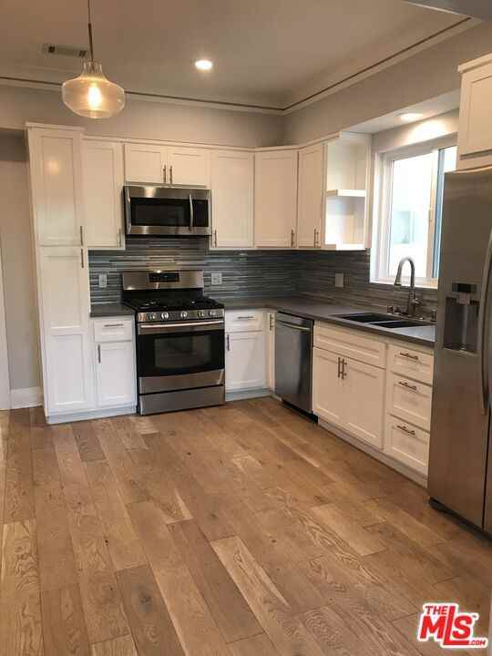 767 N Ridgewood Pl #7671-2 - Photo 4 of 9