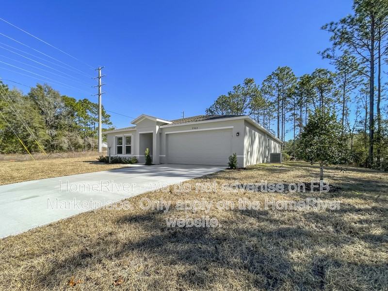 9965 N Elkcam Blvd - Photo 2 of 31