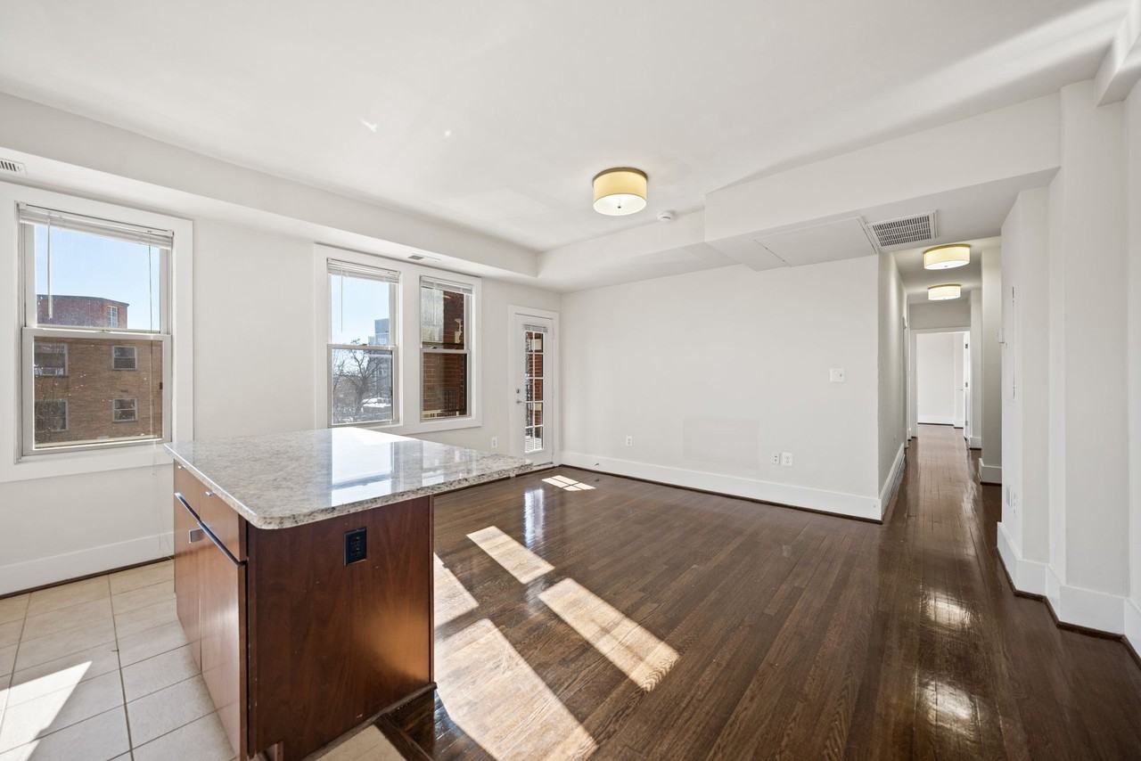 NEW QUIN APARTMENTS - Photo 6 of 50