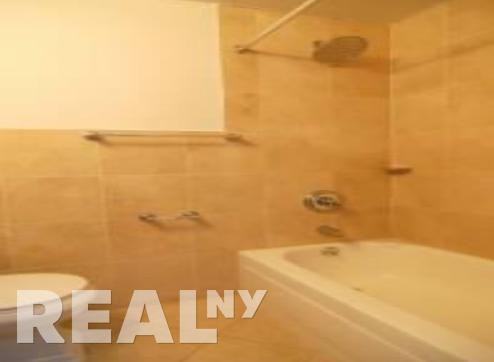 E 18th St #F4 - Photo 2 of 6