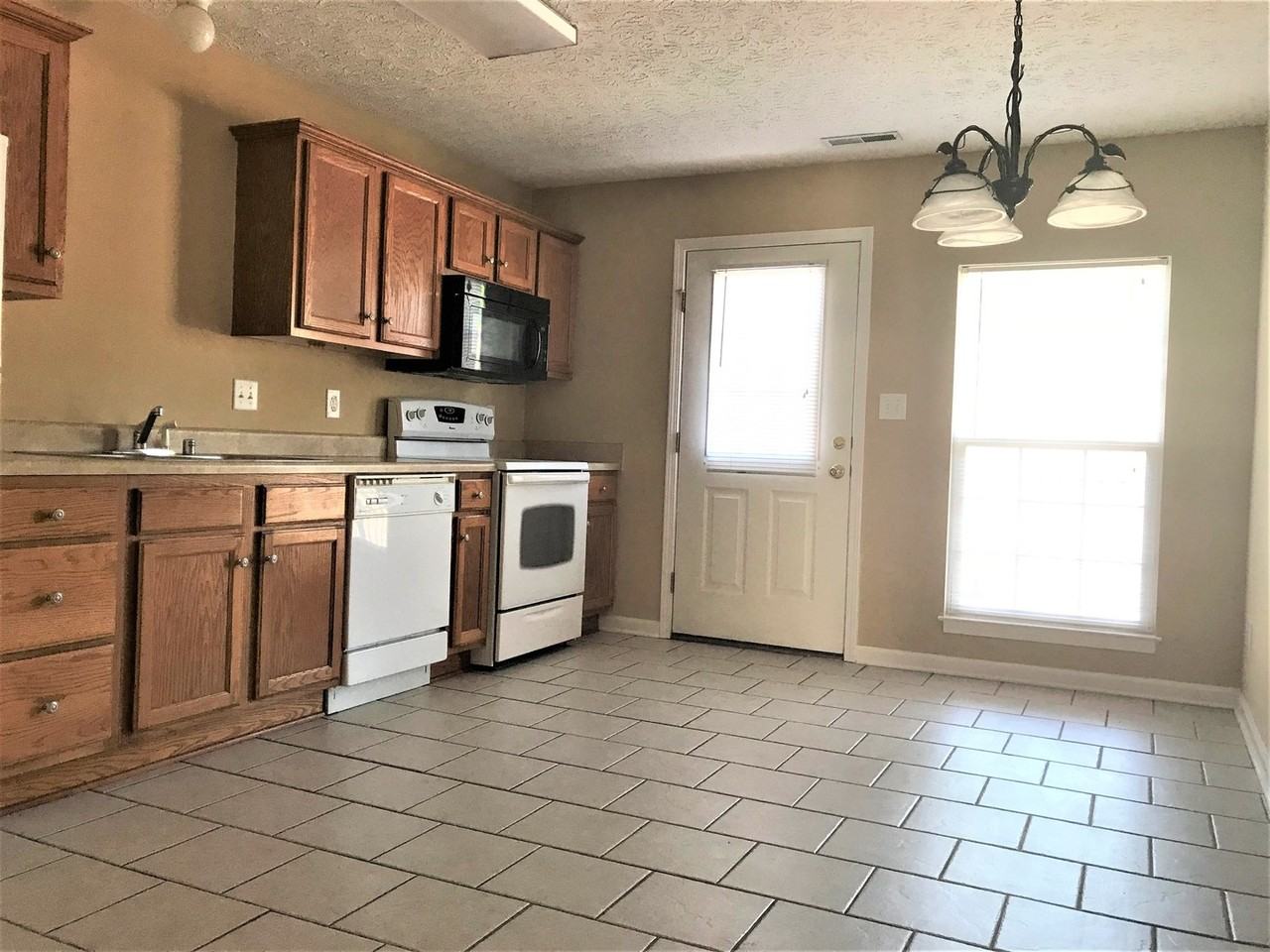 Riverwood Townhomes - Photo 4 of 36