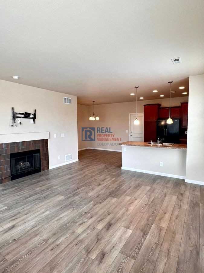 16283 W 63rd Pl #E - Photo 2 of 18