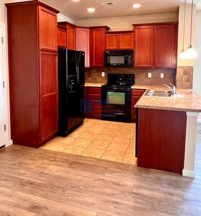 16283 W 63rd Pl #E - Photo 4 of 18