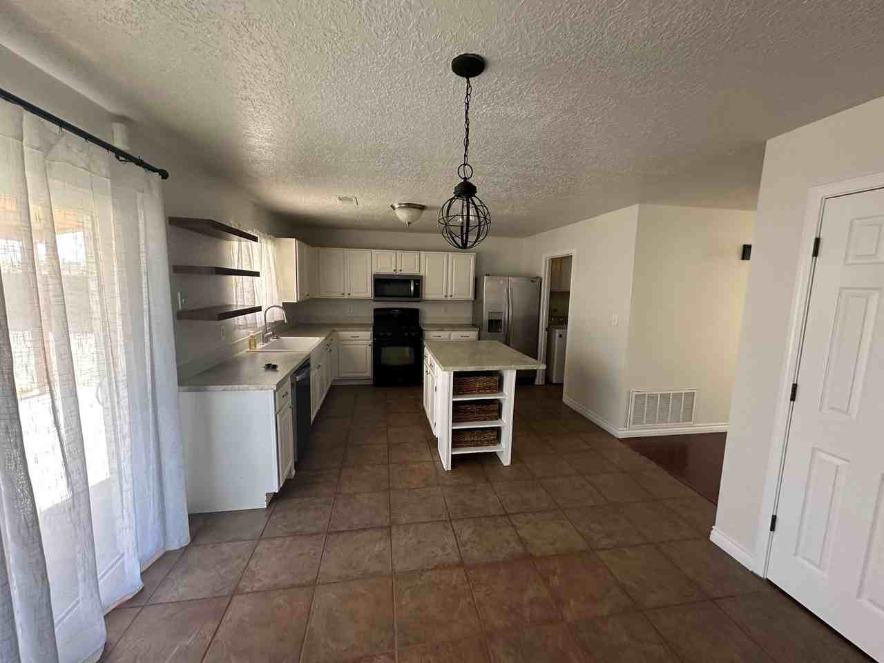 8104 Rancho Paraiso Nw - Photo 4 of 15