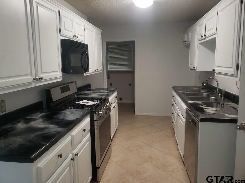 6027 Whispering Ln - Photo 3 of 29