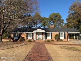 featured image of 207 W Carolina St