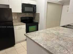 18338 Nw 68th Ave #G - Photo 1 of 1