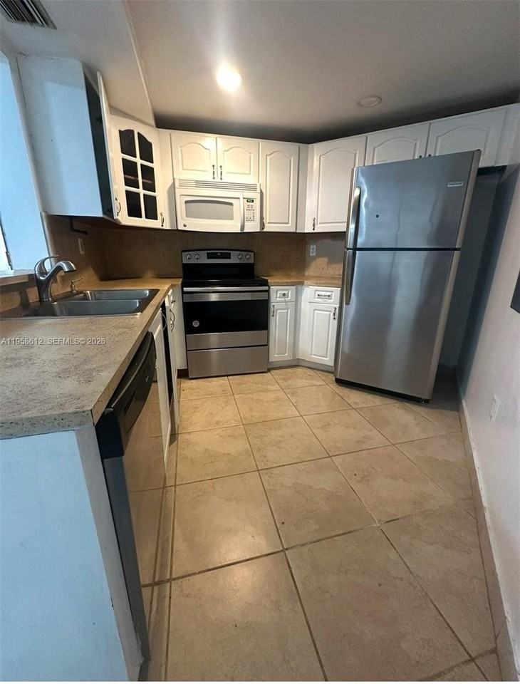 9731 Fontainebleau Blvd #F210 - Photo 2 of 13