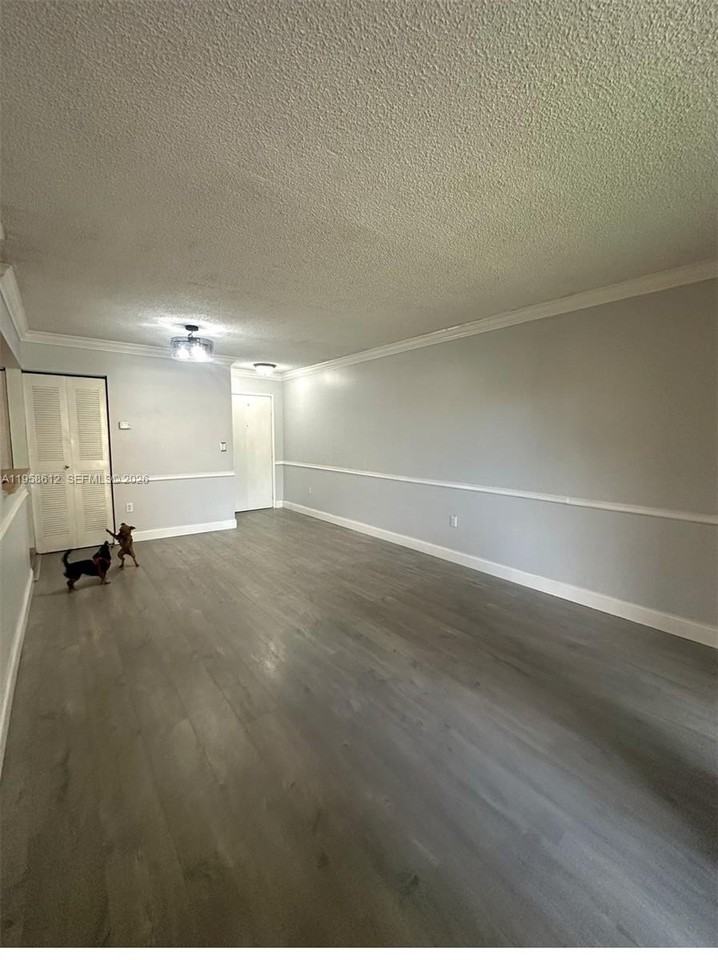 9731 Fontainebleau Blvd #F210 - Photo 3 of 13