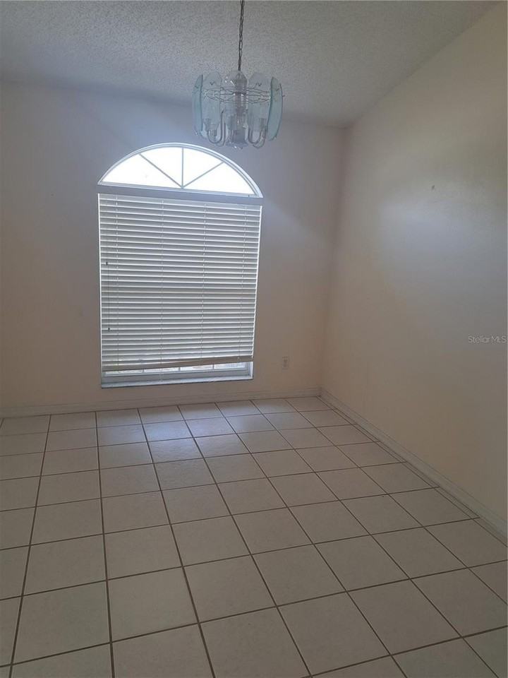 7122 87th Ln E - Photo 4 of 25