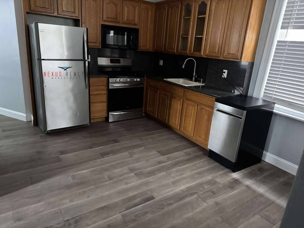 71st Street & Hazen Street #1FL - Photo 2 of 16