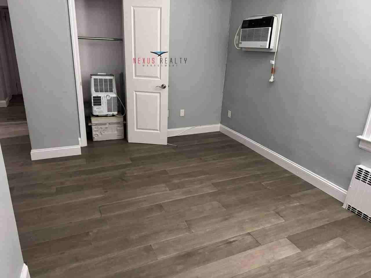 71st Street & Hazen Street #1FL - Photo 4 of 16