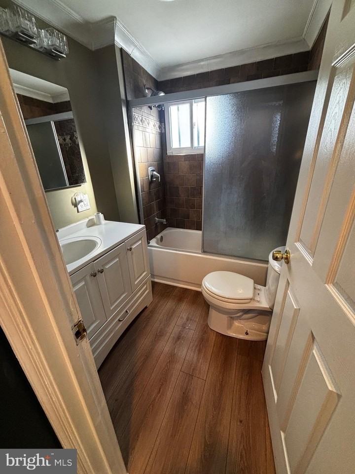 208APT 54th St - Photo 6 of 9