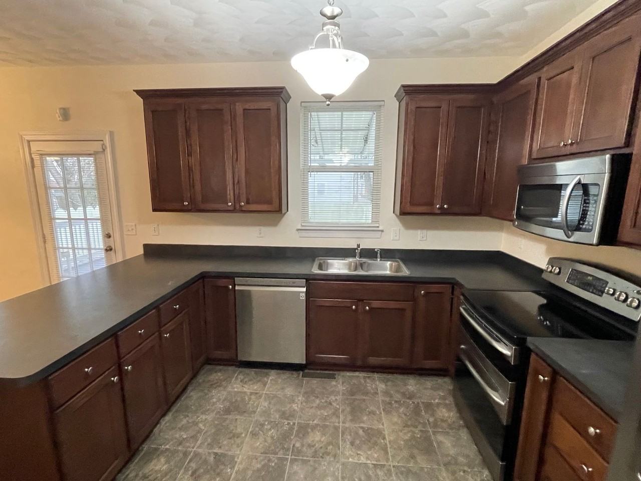 1275 W 27th St - Photo 7 of 26