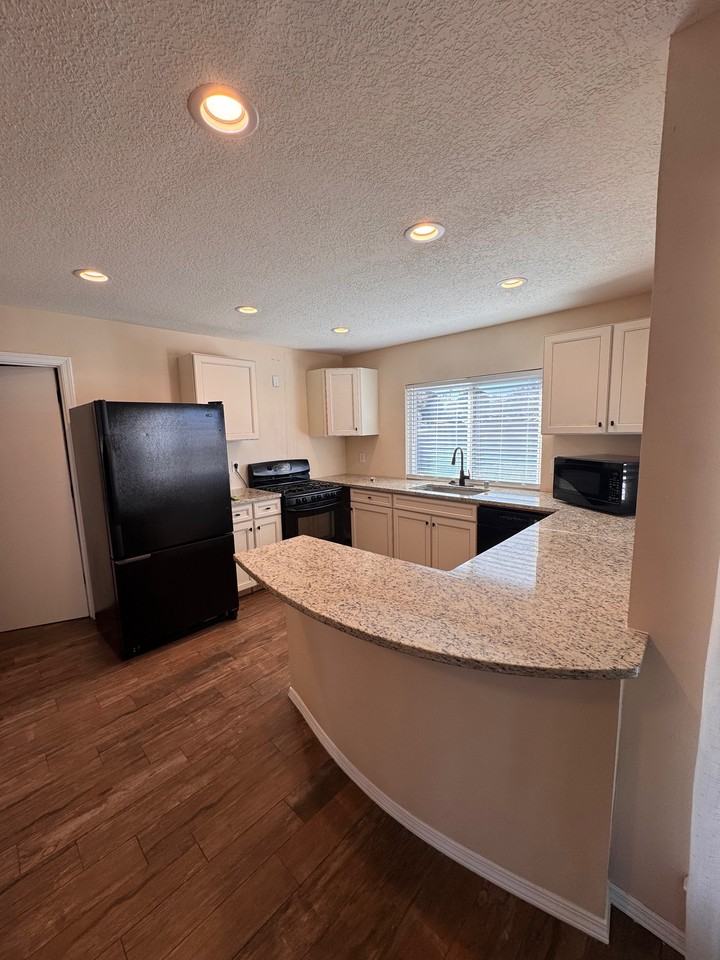 12120 Towner Ave Ne - Photo 2 of 5