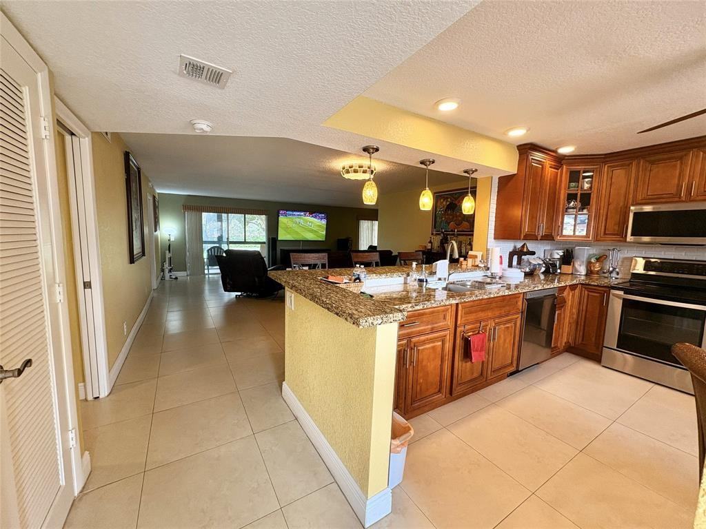 271 S Hollybrook Dr #271-205 - Photo 2 of 15