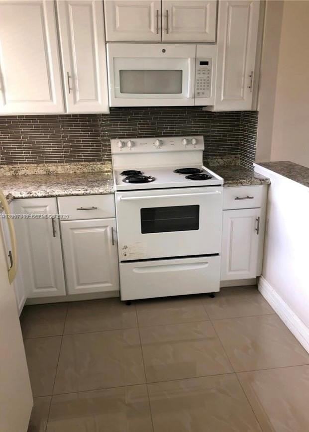 8590 Sunrise Lakes Blvd #206 - Photo 6 of 9