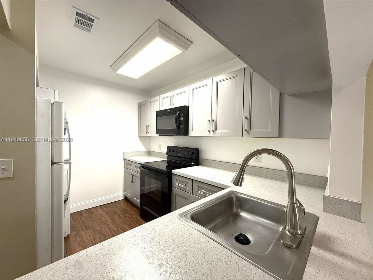 10043 Winding Lake Rd #201 - Photo 2 of 8