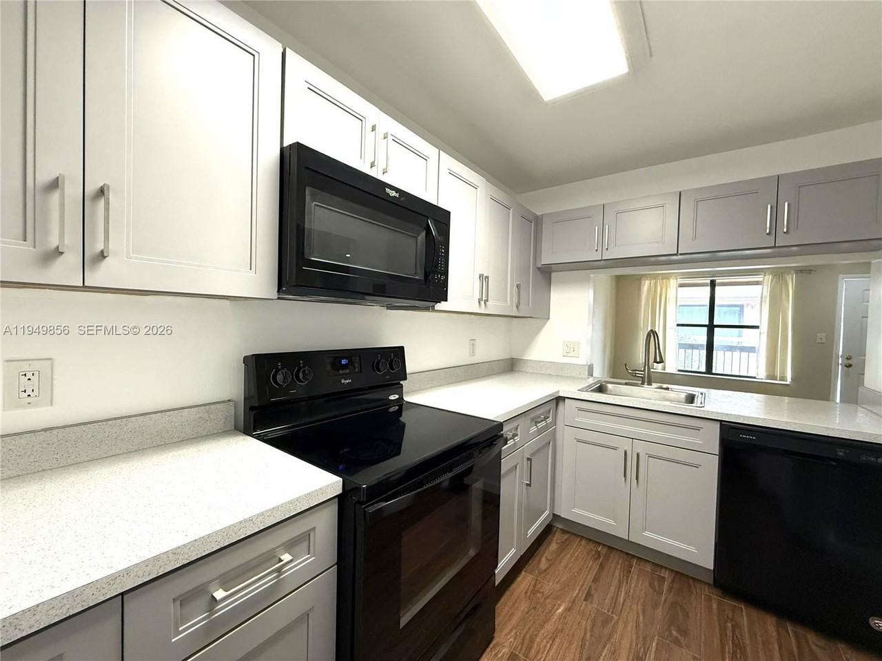 10043 Winding Lake Rd #201 - Photo 3 of 8