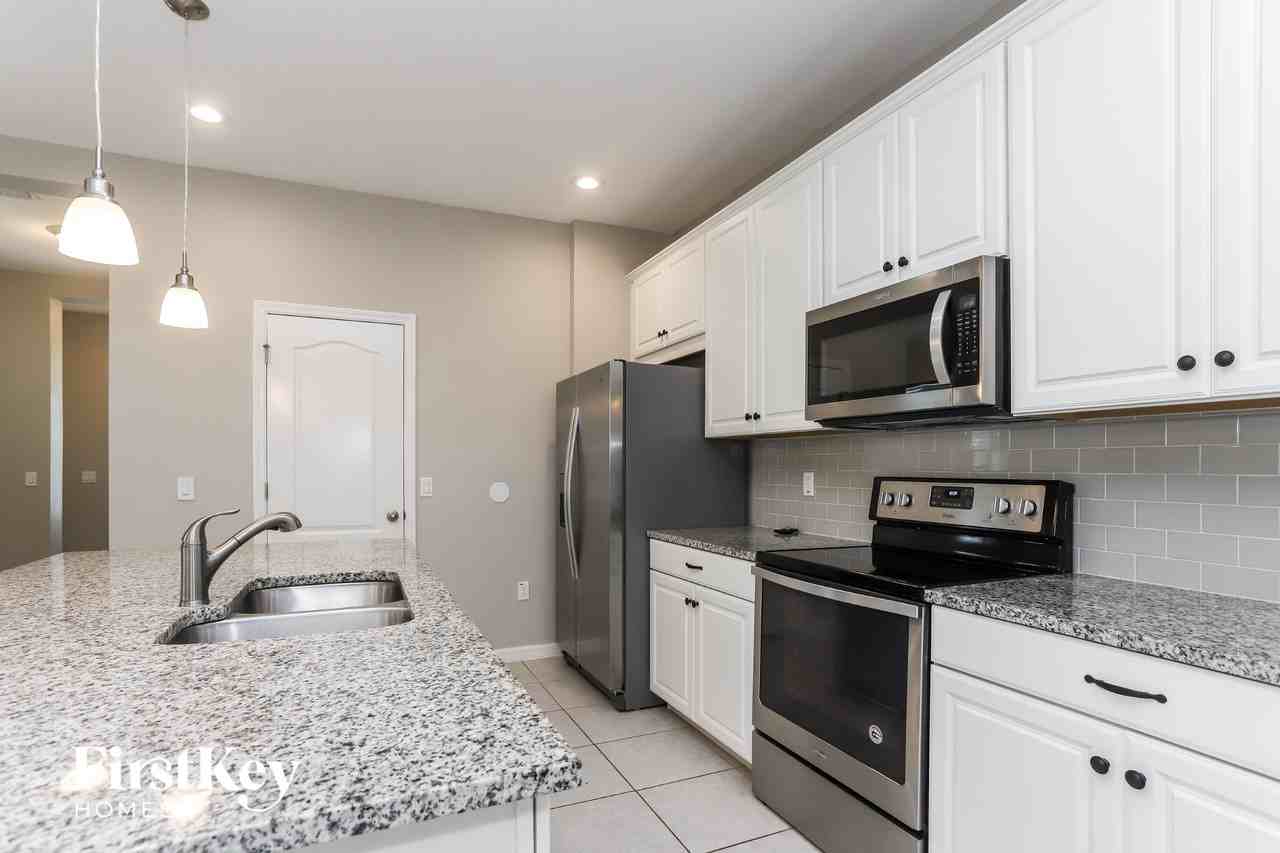 7143 Bowspirit Pl - Photo 4 of 15