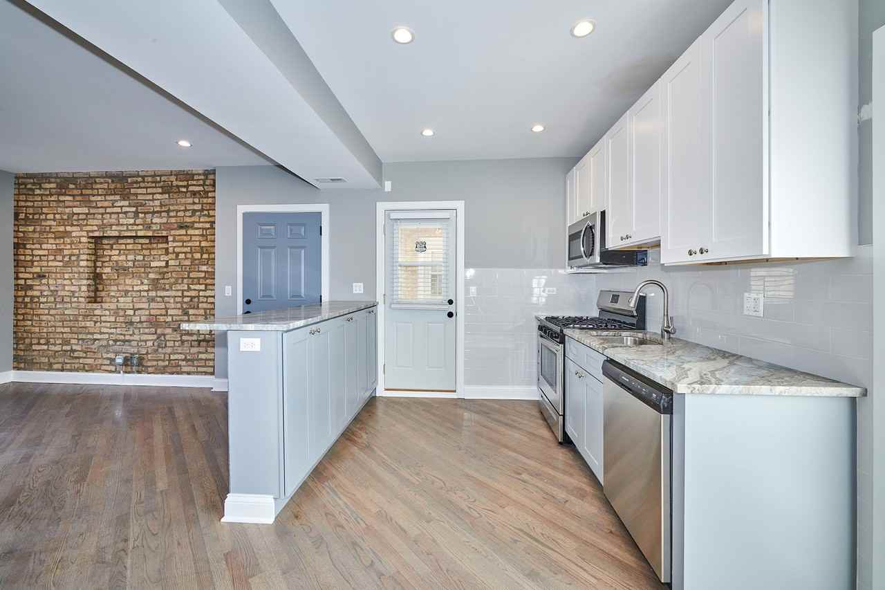 5709 W Seminole St ##1 - Photo 3 of 15