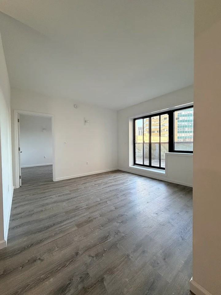 97-30 64th Ave - Photo 3 of 4