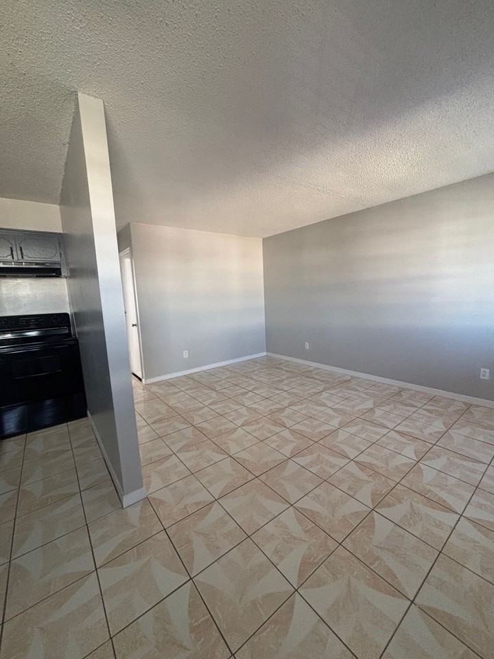 HARMONY APARTMENTS - Photo 6 of 11
