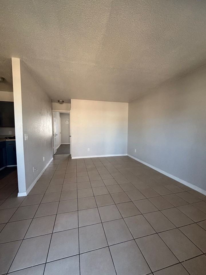 HARMONY APARTMENTS - Photo 7 of 11
