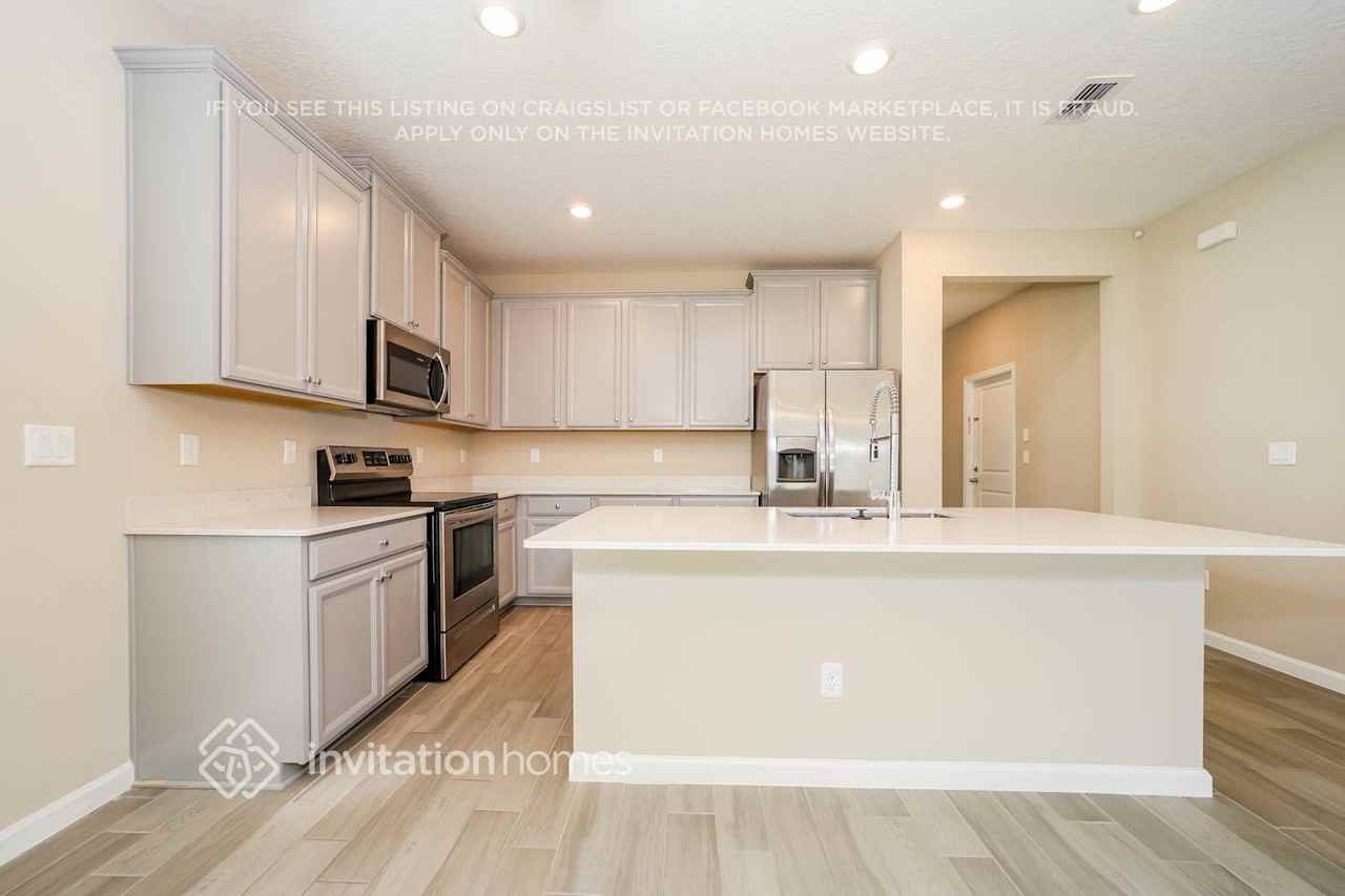 11243 Oyster Creek Rd - Photo 6 of 17