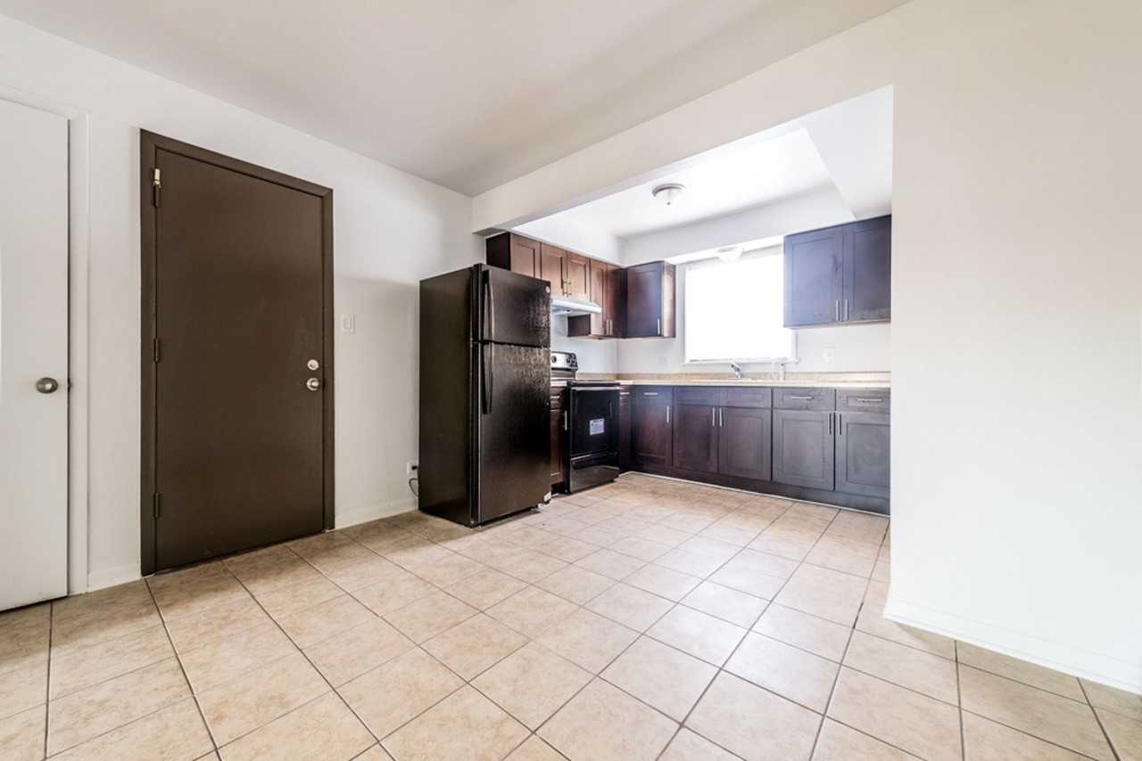 1121 W 127th ST - Photo 5 of 23