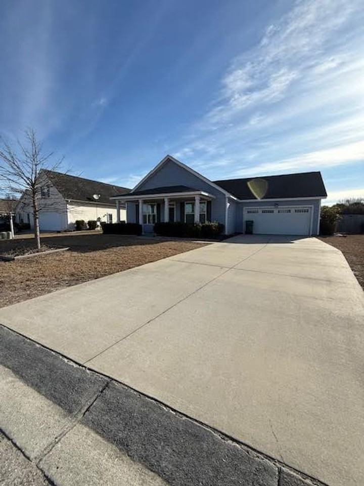 7437 Courtney Pines Rd - Photo 2 of 18