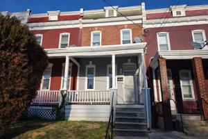 featured image of 115 W 23rd St