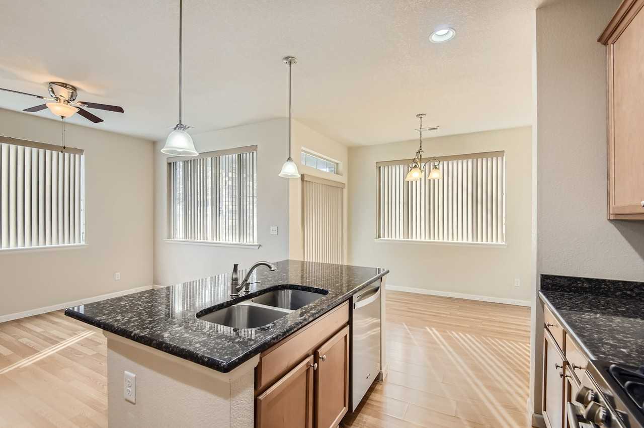 9090 East Phillips Lane - Photo 5 of 27