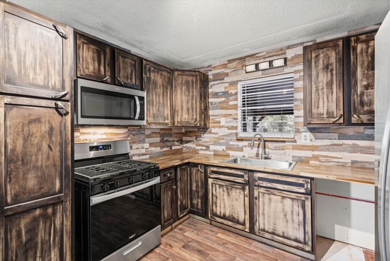 7411 Wigfield Rd - Photo 4 of 19