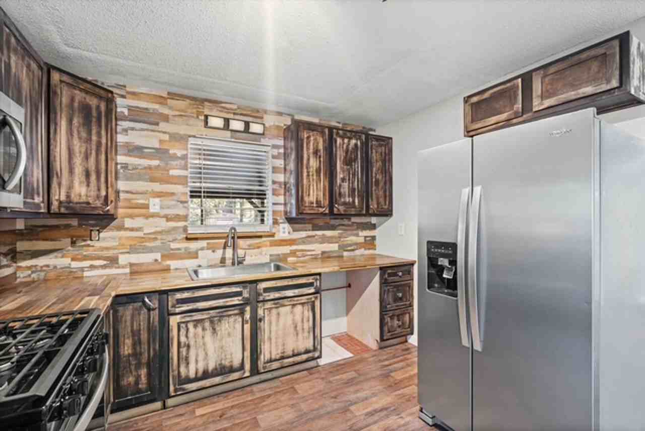 7411 Wigfield Rd - Photo 5 of 19