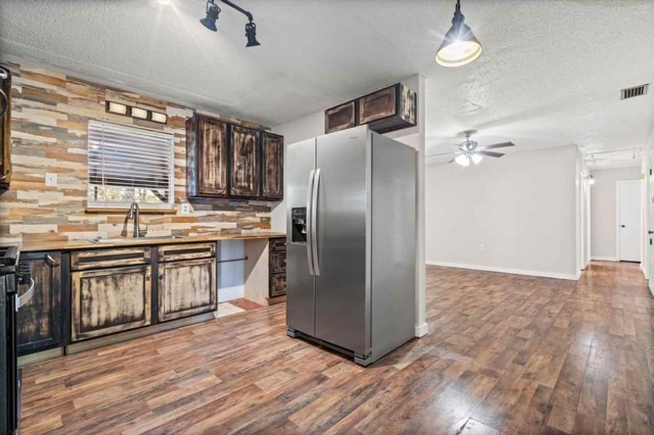 7411 Wigfield Rd - Photo 6 of 19