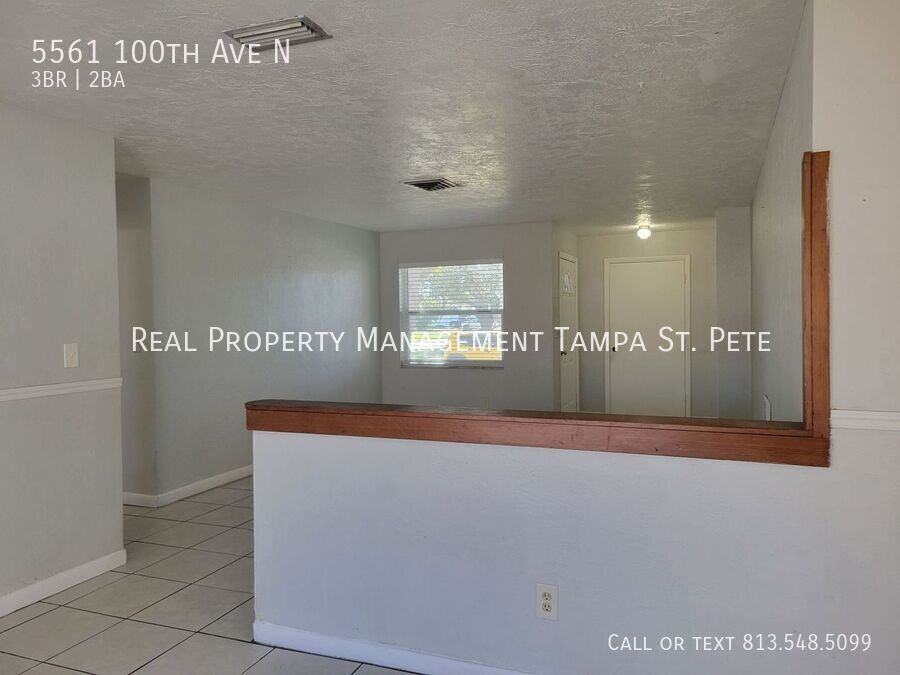 5561 100th Ave N - Photo 7 of 36