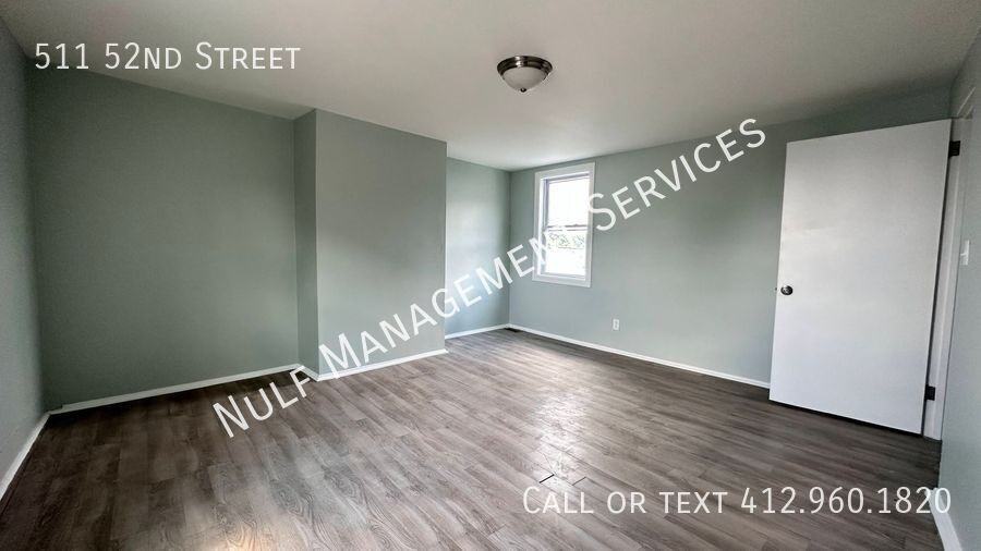 511 52nd St - Photo 6 of 11