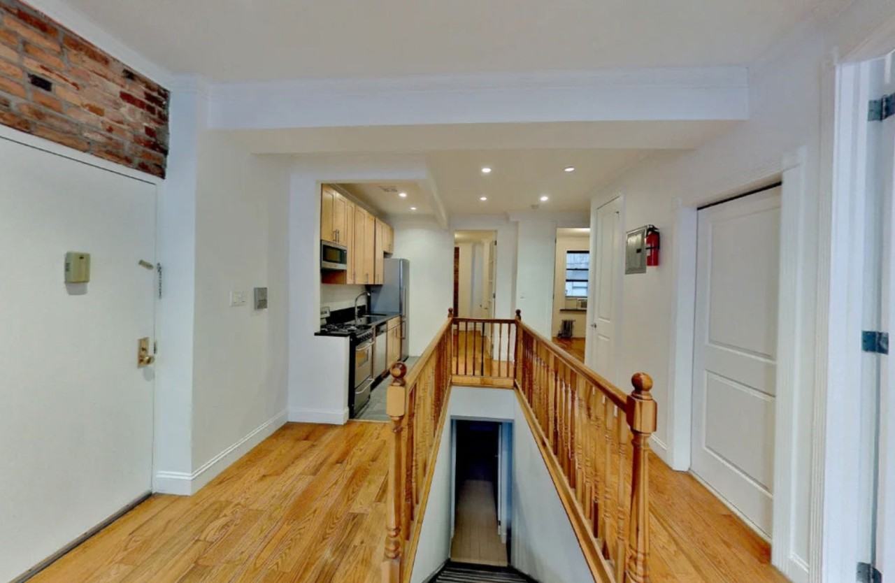 E 100th St - Photo 2 of 8