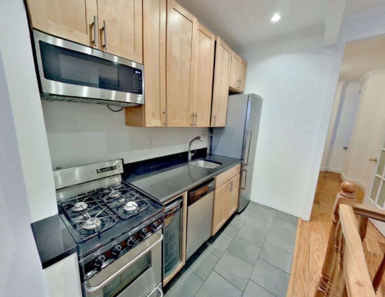 E 100th St - Photo 3 of 8