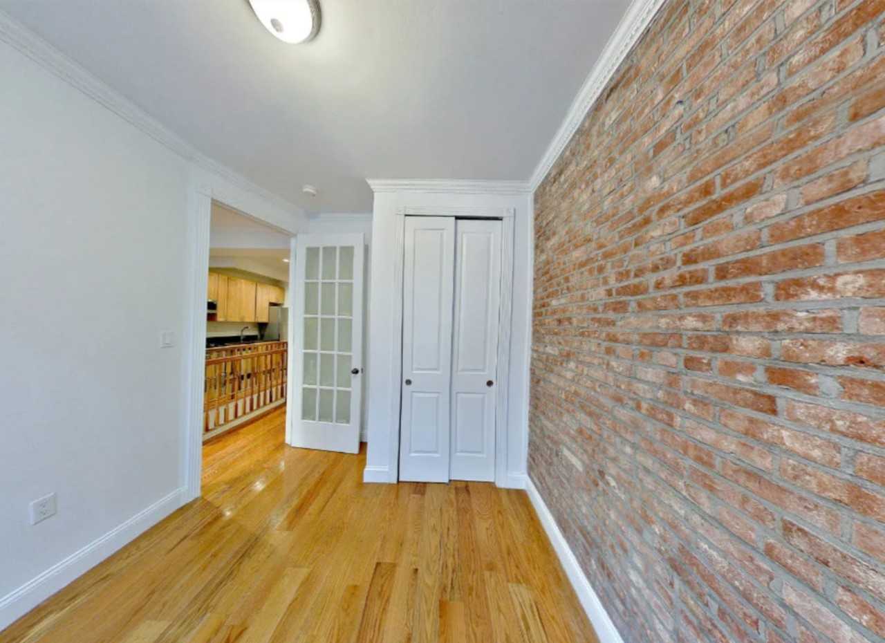 E 100th St - Photo 4 of 8