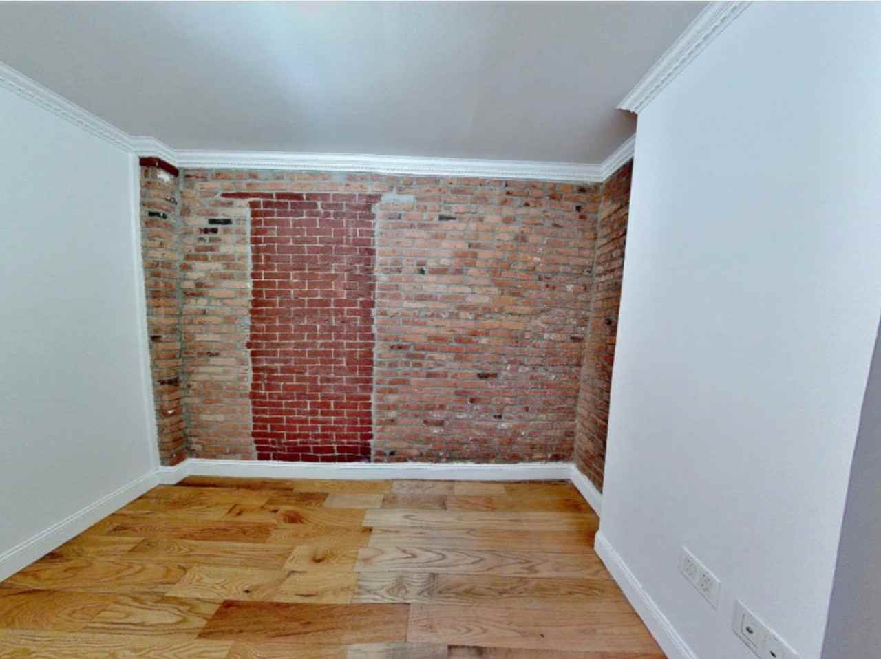 E 100th St - Photo 5 of 8