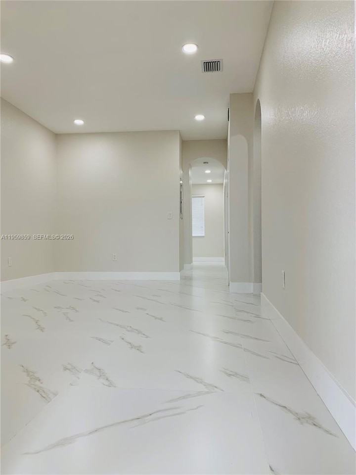 7050 Nw 177th St #203-11 - Photo 2 of 29