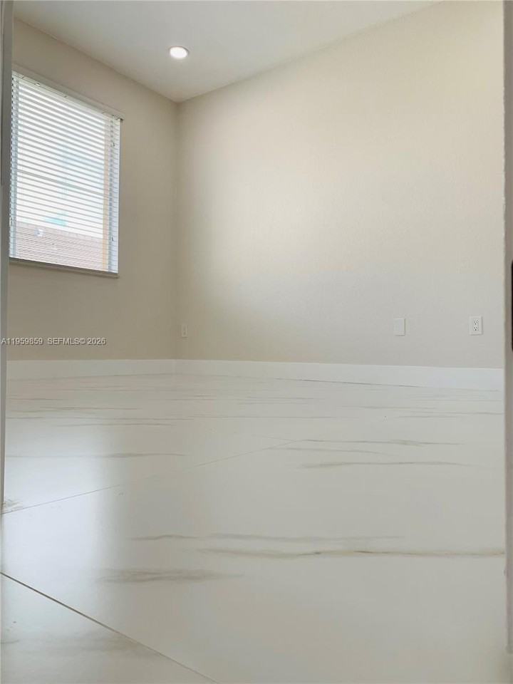 7050 Nw 177th St #203-11 - Photo 7 of 29