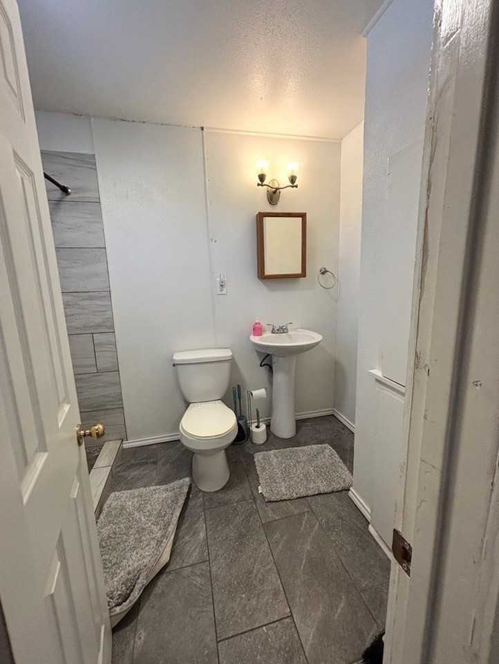 107 E 20th St - Photo 6 of 7