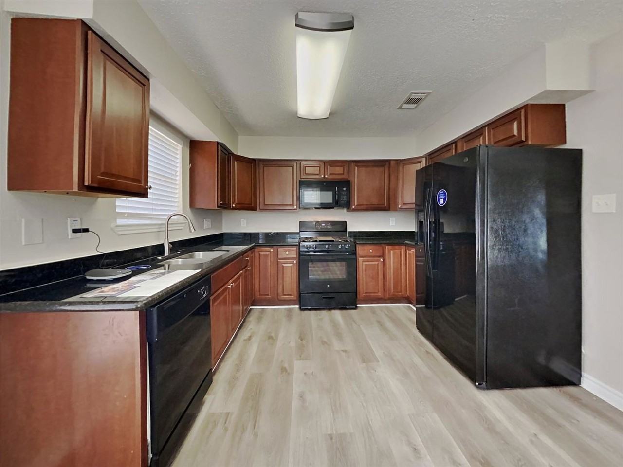 24107 Lone Elm Dr - Photo 5 of 8