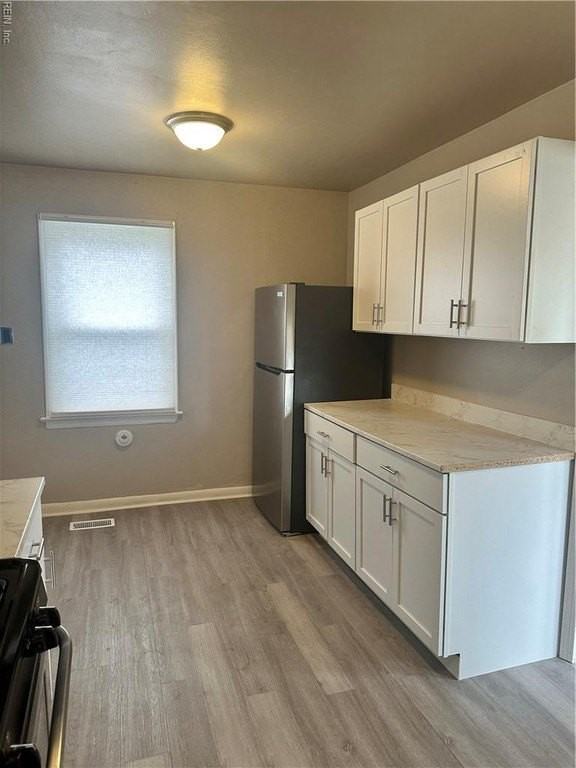 717 73rd St - Photo 4 of 21